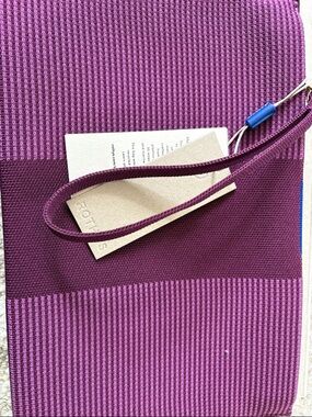Rothy's the wristlet grape stripe new with tags